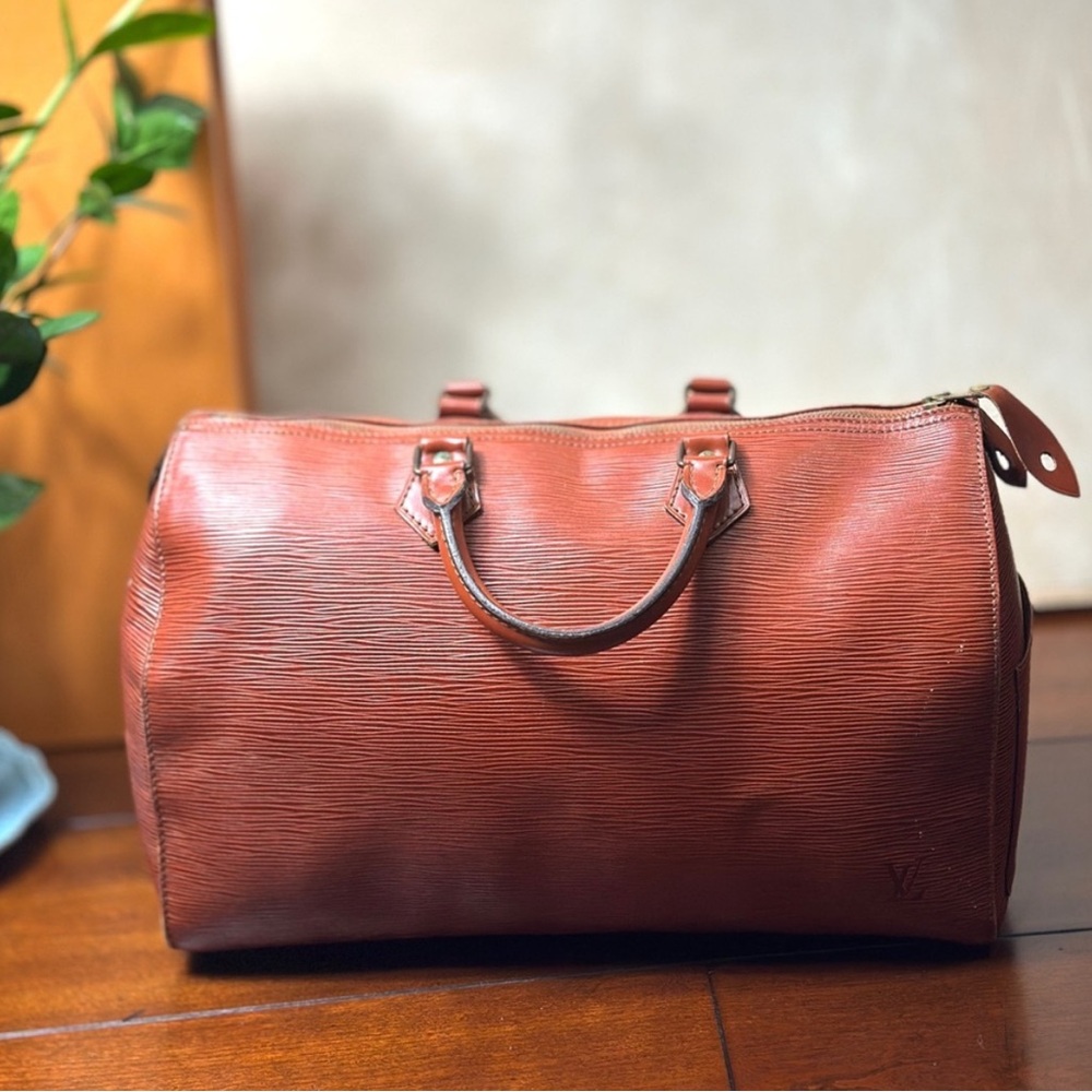 Louis Vuitton brown Duffel Bag